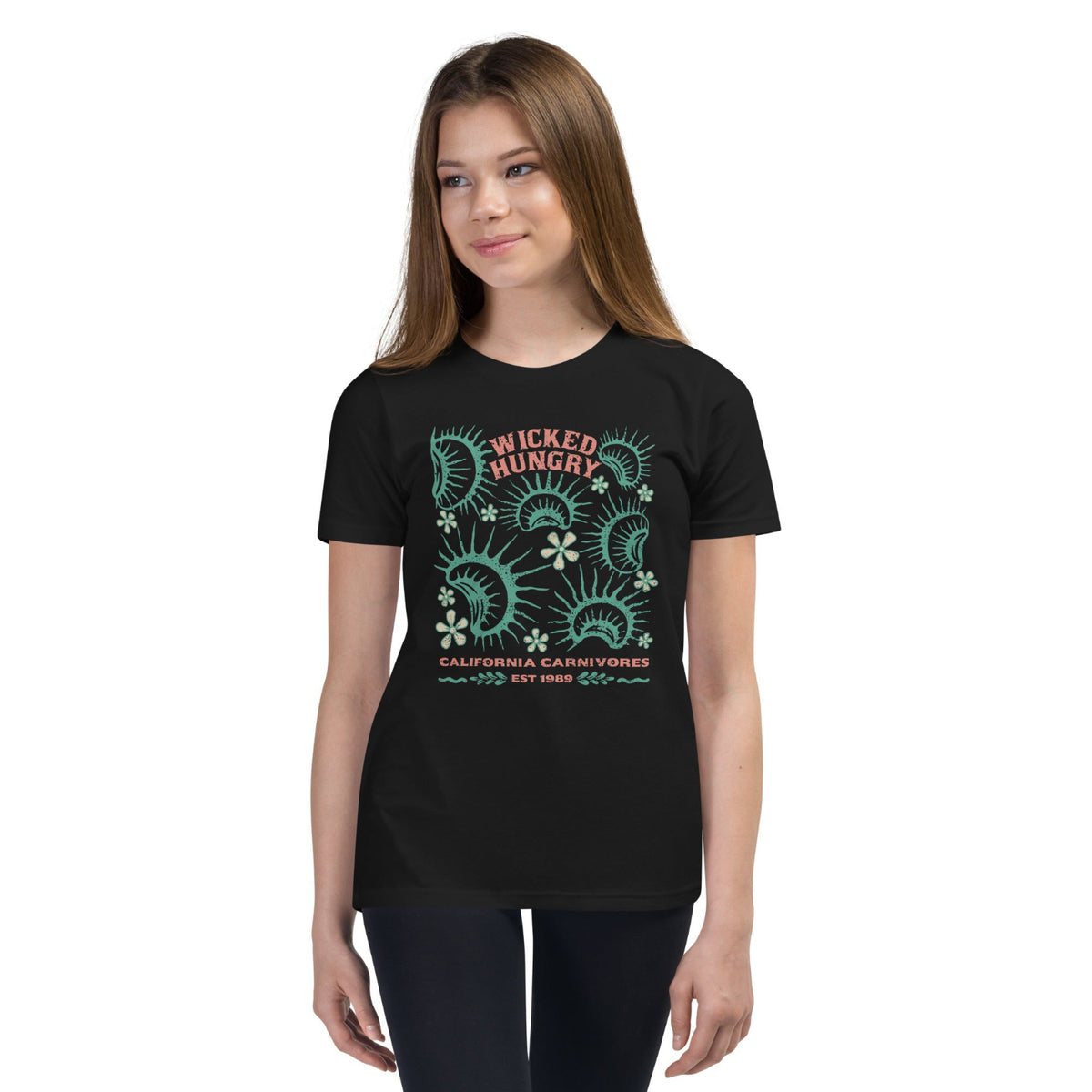 Black Tshirt with Wicked Hungry written across the top middle and venus flytraps surrounding it