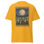Yellow t-shirt with 'The Moon' graphic design featuring a moon and trees on a white background