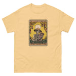Yellow t-shirt with a graphic of a skeleton gardener and text 'The Savage Gardener' on a white background.