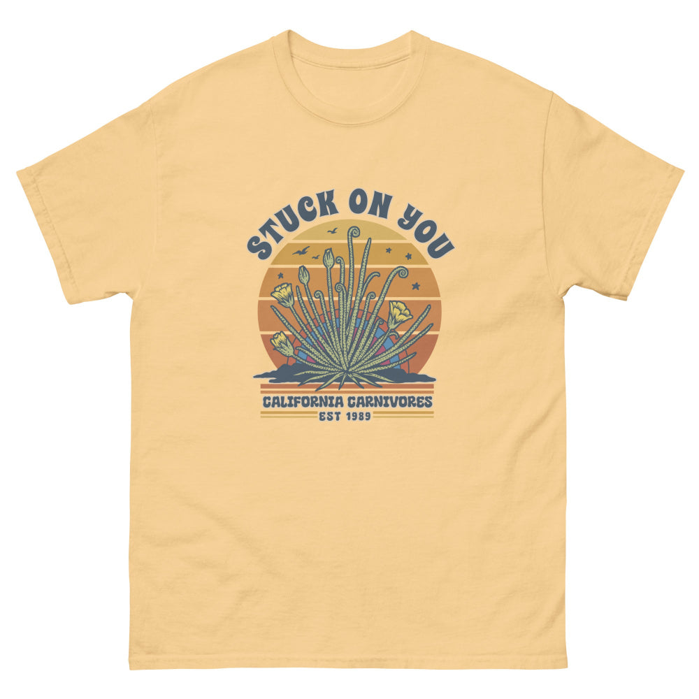 Yellow t-shirt with graphic design and text on a white background
