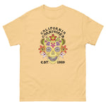 Beige t-shirt with a colorful skull design and 'California Carnivores' text on a white background